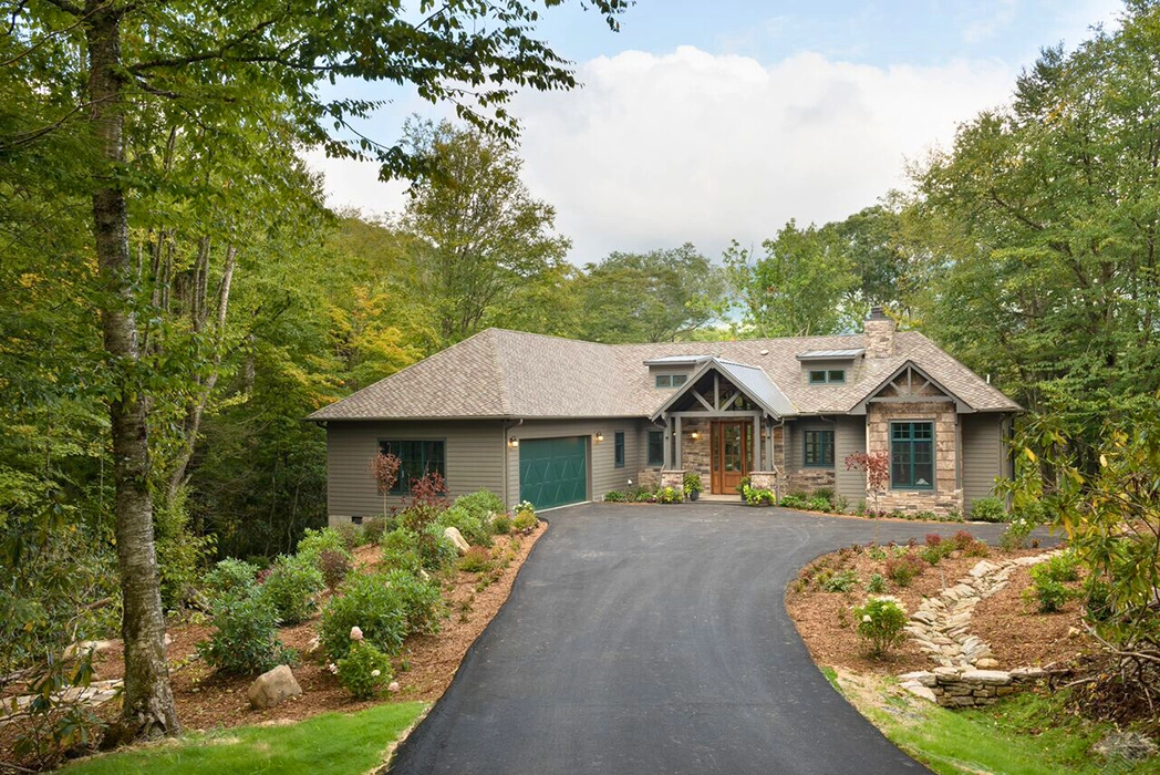 exterior of home in the woods at The Cottages at Cranberry Cove