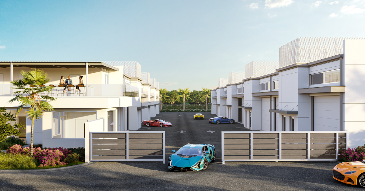Rendering of gated luxury garage units with exotic sports cars.